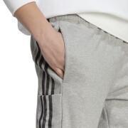 Tute da jogging elasticizzate adidas 3-Stripes Essentials French Terry